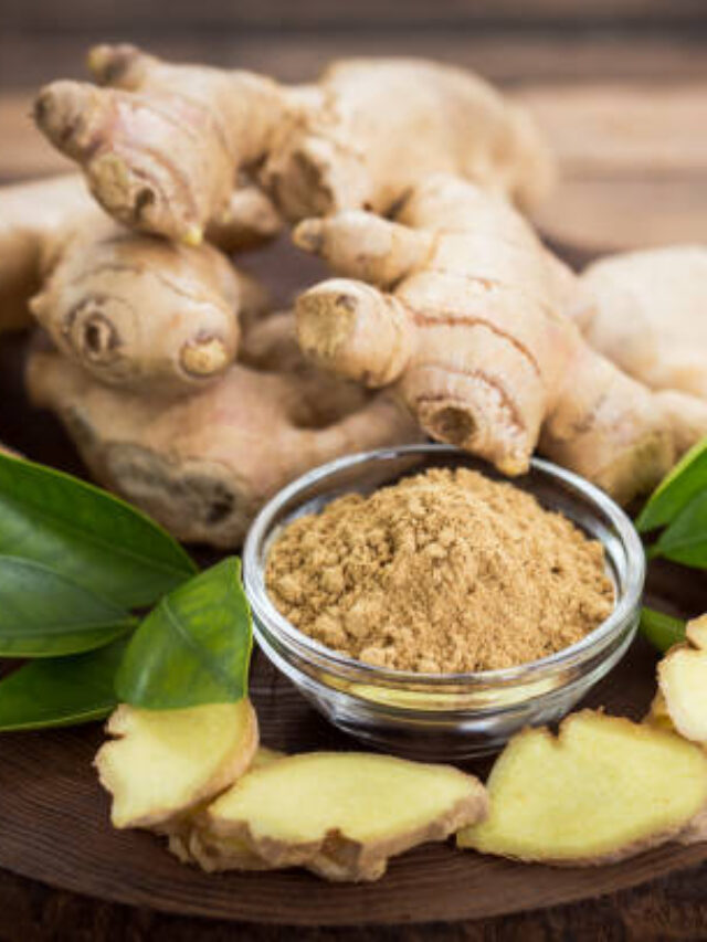 Ginger root and ginger powder in the bowl
