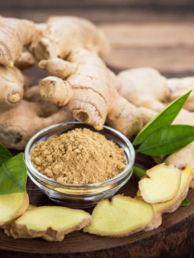 Ginger root and ginger powder in the bowl